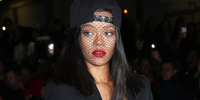 PARIS, FRANCE - MARCH 02: Rihanna attends the Givenchy show as part of the Paris Fashion Week Womenswear Fall/Winter 2014-2015 on March 2, 2014 in Paris, France. (Photo by Pierre Suu/Getty Images)
