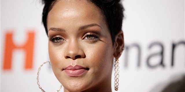 Feb. 7, 2009: In this file photo, Rihanna arrives at the Clive Davis pre-Grammy party in Beverly Hills, Calif.