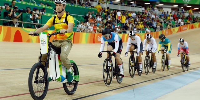 Cyclists compete in the Women's Keirin first round at the Rio Olympic Velodrome during the 2016 Summer Olympics in Rio de Janeiro, Brazil, Saturday, Aug. 13, 2016. (AP Photo/Patrick Semansky)