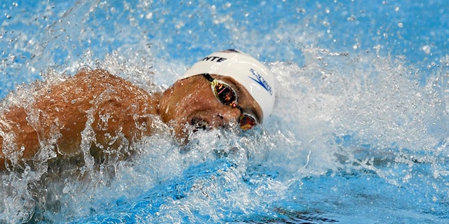 Ryan Lochte swims his leg in a men's 4x200-meter freestyle relay heat at the 2016 Summer Olympics. (AP Photo/Martin Meissner)