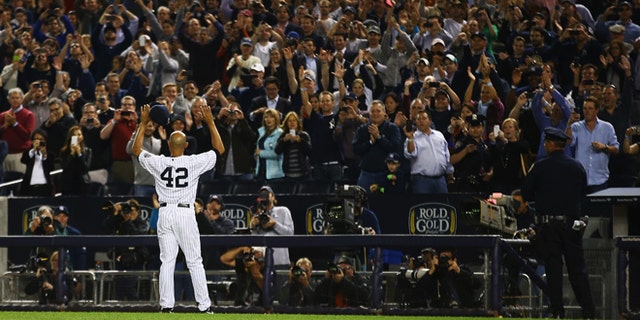 Mariano Rivera waves to the crowd on September 26, 2013 at the Yankee Stadium.