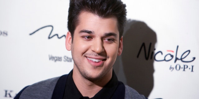 Television personality Rob Kardashian arrives at the opening of the Kardashian Khaos store at the Mirage Hotel and Casino in Las Vegas, Nevada December 15, 2011.