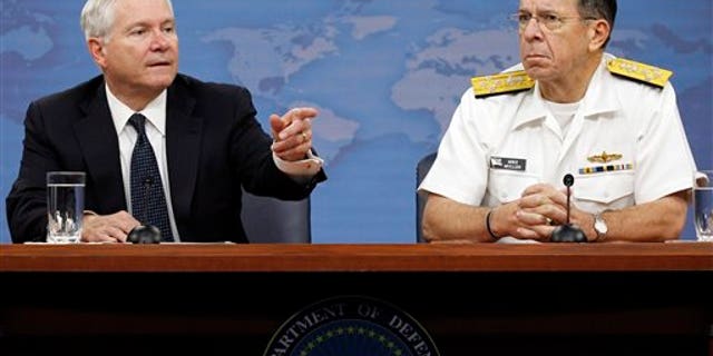 May 18: Secretary of Defense Robert M. Gates and Chairman of the Joint Chiefs of Staff Adm. Mike Mullen at the Pentagon in Washington.