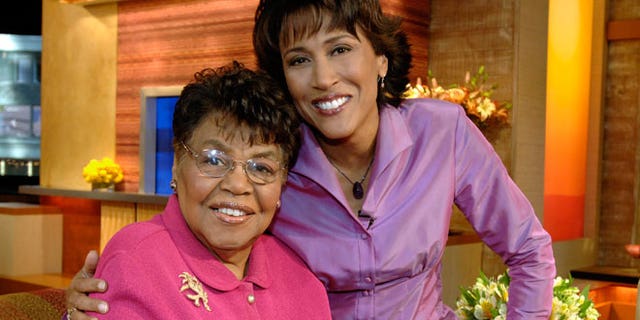 This 2006 photo released by ABC shows "Good Morning America" co-host Robin Roberts, right, with her mother, the late Lucimarian Roberts on the set in New York.