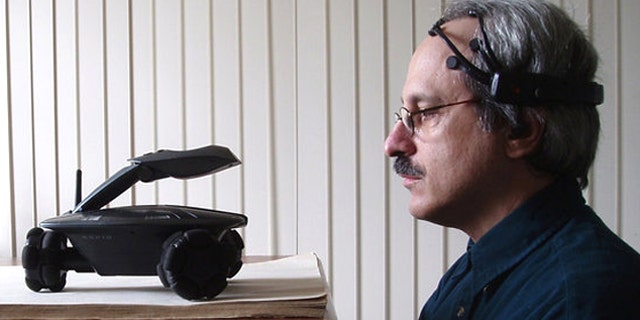 Inventor Robert Oschler wears a kit made of off-the-shelf parts that he says could help a disabled person interact with the physical world.