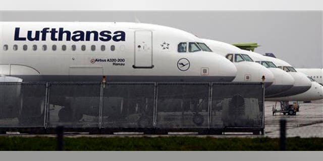 Lufthansa planes are parked at the airport at the airport in Munich, southern Germany.