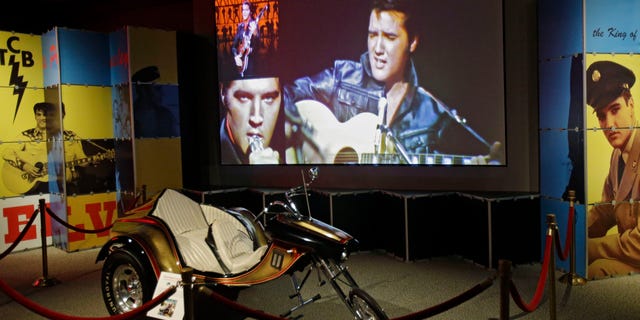 In this Nov. 25, 2013 photo, a custom motorcycle is displayed in the Elvis exhibit at the Rock and Roll Hall of Fame and Museum in Cleveland. Over 40 new items on loan from Graceland, excluding the cycle, will be displayed when the exhibit reopens.