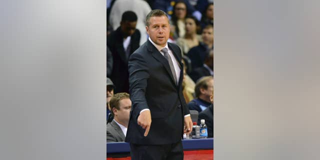 Memphis Grizzlies head coach David Joerger gestures in the second half of an NBA basketball game against the Houston Rockets, Monday, Nov. 17, 2014, in Memphis, Tenn. The Grizzlies won 119-93. (AP Photo/Brandon Dill)