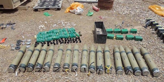 A failed Improvised Rocket-Assisted Missile attack on a U.S. military outpost in eastern Iraq led an explosives team to this nearby weapons cache in July. Analysis indicates that the 107mm rockets are unique to Iranian design and manufacturing, validating U.S. assertions that the Iranian Regime has been playing an increasingly nefarious role within Iraq’s borders.