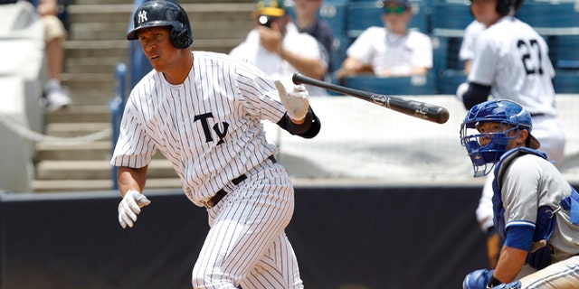 New York Yankees' Alex Rodriquez drops the bat as he heads for first with a single in the sixth inning for the Tampa Yankees against the Dunedin Blue Jays in a minor league baseball rehab game in Tampa, Fla., Wednesday, July 10, 2013. (AP Photo/Scott Iskowitz)