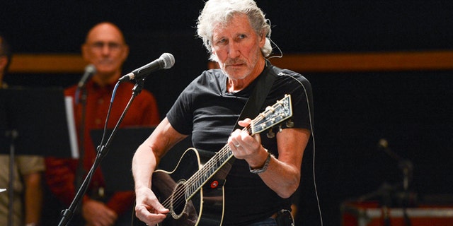 FILE - In this Nov. 4, 2013 file photo, musician Roger Waters and his band hold rehearsals with members of the Wounded Warriors Project, in New York.