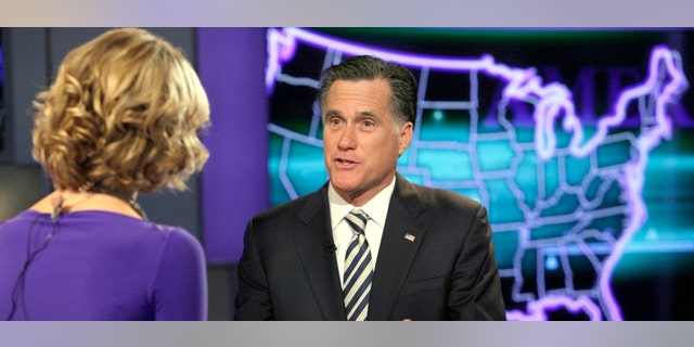 Republican presidential candidate, former Massachusetts Gov. Mitt Romney is interviewed by Megyn Kelly during a segment of "America Live" on the Fox News Channel, in New York, Wednesday, March 14, 2012. (AP Photo/Richard Drew)