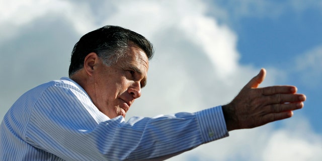 Republican presidential candidate, former Massachusetts Gov. Mitt Romne campaigns at Paramount Printing in Jacksonville, Fla., Thursday, Jan. 26, 2012. (AP Photo/Charles Dharapak)