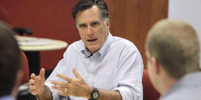 Republican presidential hopeful, former Massachusetts Gov. Mitt Romney meets with entrepreneurs at Bizdom U in Detroit, Thursday, June 9, 2011. Bizdom U is a business development center to help entrepreneurs start up businesses in the state. (AP Photo/Carlos Osorio)