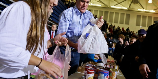 Tuesday, Oct. 30, 2012: Mitt Romney participates in an event to collect supplies for victims of superstorm Sandy, in Kettering, Ohio.