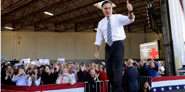 Wednesday, Oct. 31, 2012: Mitt Romney arrives at a campaign stop in Tampa, Fla.