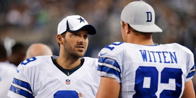 FILE -  In this Saturday, Aug. 24, 2013 file photo, Dallas Cowboys quarterback Tony Romo (9) and tight end Jason Witten (82) talk on the sideline during the second half of a preseason NFL football game against the Cincinnati Bengals,in Arlington, Texas. Quarterback Tony Romo is hurt again, and his favorite tight end is here to tell you the Cowboys can make it work without him, Tuesday, Aug. 30, 2016. (AP Photo/Sharon Ellman, File)