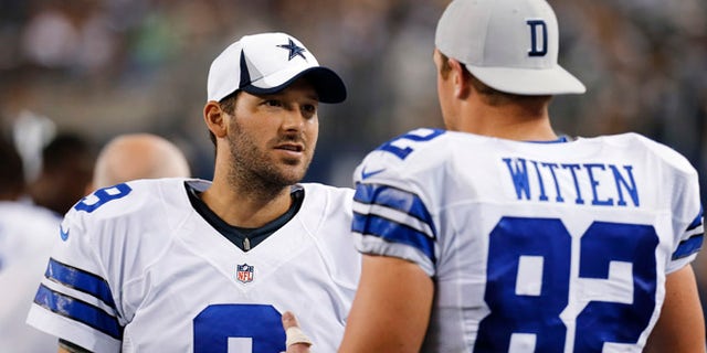 FILE - In this Saturday, Aug. 24, 2013 file photo, Dallas Cowboys quarterback Tony Romo (9) and tight end Jason Witten (82) talk on the sideline during the second half of a preseason NFL football game against the Cincinnati Bengals,in Arlington, Texas. Quarterback Tony Romo is hurt again, and his favorite tight end is here to tell you the Cowboys can make it work without him, Tuesday, Aug. 30, 2016. (AP Photo/Sharon Ellman, File)