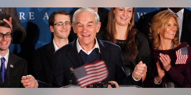 Republican presidential candidate, Rep. Ron Paul, R-Texas, speaks to supporters during an election night really in Manchester, N.H., Tuesday, Jan. 10, 2012. (AP Photo/Bill Sikes)