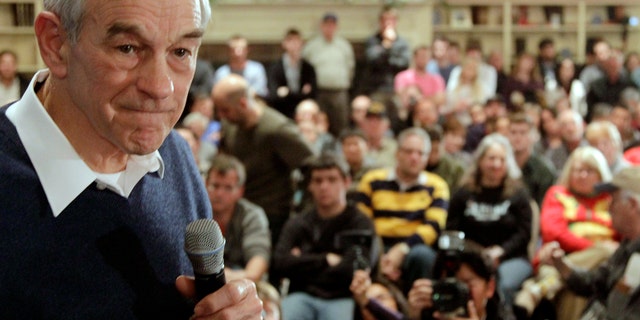 Republican presidential candidate, Rep. Ron Paul, R-Texas, listens to a question during a town hall style meeting  in Meredith, N.H., Sunday, Jan. 8, 2012. (AP Photo/Stephan Savoia)