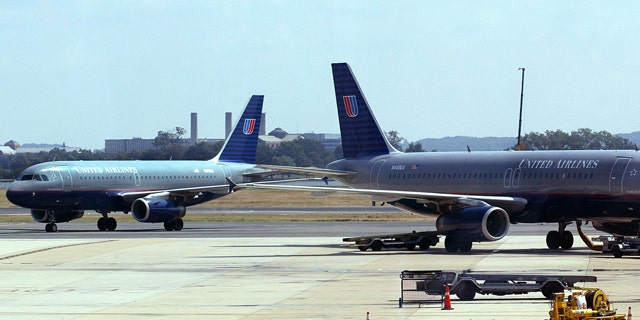 FILE: 2000: A United Airlines planes on the tarmac at Ronald Reagan National Airport, outside of Washington, D.C.