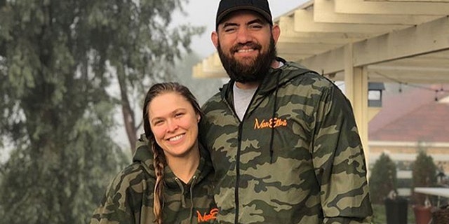 Ronda Rousey, left, and Travis Browne married in August 2017.
