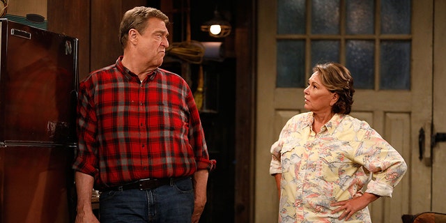 ROSEANNE - "Twenty Years to Life" - Roseanne and Dan adjust to living under the same roof with Darlene and her two children, Harris and Mark, when Darlene loses her job. Meanwhile, Becky announces she is going to be a surrogate to make extra money; and Roseanne and Jackie are at odds with one another, on the season premiere and first episode of the revival of "Roseanne," TUESDAY, MARCH 27 (8:00-8:30 p.m. EDT), on The ABC Television Network. (ABC/Adam Rose)JOHN GOODMAN, ROSEANNE BARR