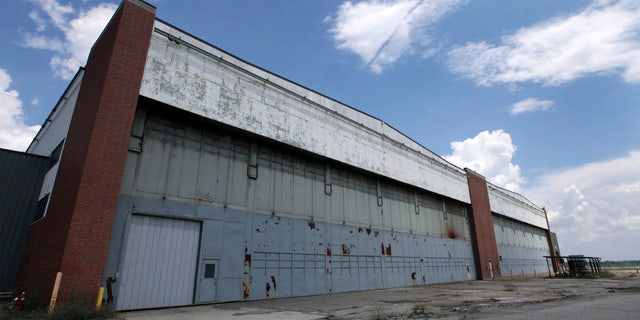 July 17, 2013: Part of the former Willow Run Bomber Plant stands in Ypsilanti Township, Mich. A group wants to preserve a portion of the plant and house a museum there dedicated to aviation and the countless Rosies across the country. Save the Bomber Plant officials have until May 1, to raise the remainder of the $8 million needed to save the plant from demolition. (AP Photo/Paul Sancya, File)