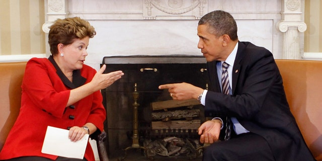 U.S. President Barack Obama and Brazilian President Dilma Rousseff meet in the Oval Office on April 9, 2012.