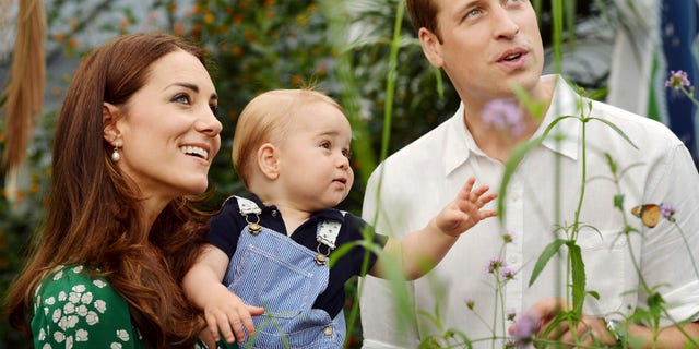 July 2, 2014 - FILE photo of Britain's Catherine, Duchess of Cambridge, carrying her son, Prince George, alongside her husband Prince William as they visit the the Natural History Museum in London.