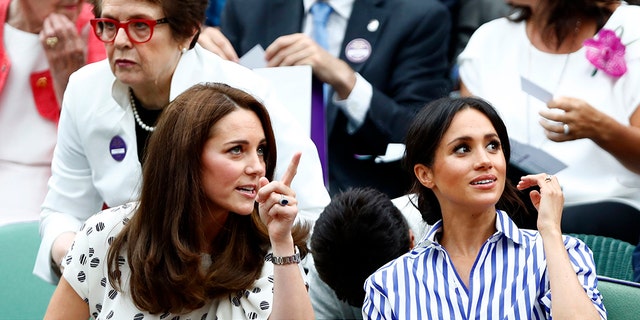 The royals, both 36, were all smiles for the high profile London match up.