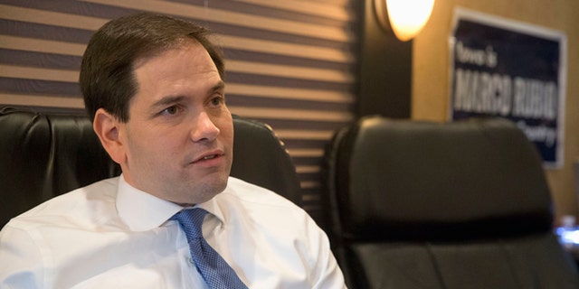 Republican presidential candidate Sen. Marco Rubio, R-Fla., speaks during a interview with The Associated Press, Friday, Jan. 29, 2016, in Burlington, Iowa. Rubio isnt backing off his position that would allow millions of people in the country illegally to stay, saying Americans are prepared to deal with a process that does not involve mass deportations. (AP Photo/Mary Altaffer)