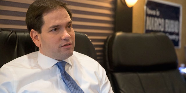 Republican presidential candidate Sen. Marco Rubio, R-Fla., speaks during a interview with The Associated Press, Friday, Jan. 29, 2016, in Burlington, Iowa. Rubio isnt backing off his position that would allow millions of people in the country illegally to stay, saying Americans are prepared to deal with a process that does not involve mass deportations. (AP Photo/Mary Altaffer)