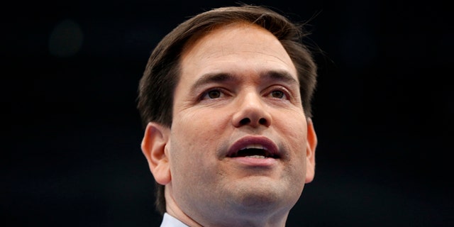 FILE - In this March 14, 2016, file photo, then-Republican presidential candidate Sen. Marco Rubio, R-Fla., speaks during a campaign rally at Palm Beach Atlantic University in West Palm Beach, Fla. Rubio suggests he is reconsidering his plans to leave the Senate at the end of this year, and may run for re-election instead. Rubio tells reporters that he will let everyone know about any change of status next week after spending some time with his family. The filing deadline for the Florida Senate race is June 24. (AP Photo/Paul Sancya, File)