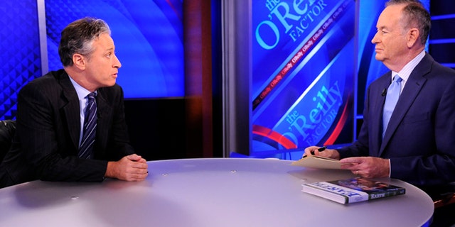 Sept. 22, 2010:This file photo shows Comedy Central's Jon Stewart from "The Daily Show with Jon Stewart" left, and and political pundit Bill O'Reilly during an interview for "The O'Reilly Factor" on FOX News Channel, in New York.