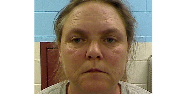 This photo released by the Etowah County Sheriff's Office shows Joyce Hardin Garrard, who is is charged with capital murder, accused of making her 9-year-old granddaughter, Savannah Hardin, run until the girl collapsed and died, all as punishment for lying about candy. (AP/Etowah County Sheriff's Office)