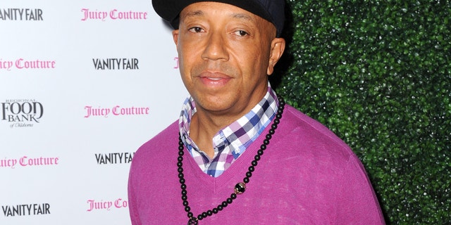 In this Feb. 18, 2013 file photo, Russell Simmons arrives at the Vanity Fair and Juicy Couture Celebration for the 2013 Vanities Calendar in Los Angeles. Simmons is apologizing for a parody video of Harriet Tubman in a sex tape that appeared on his All Def Digital YouTube channel.