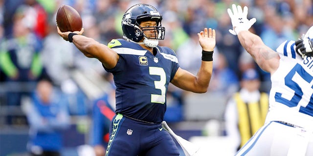 Seattle Seahawks quarterback Russell Wilson, seen in this file photo, will reportedly join the Double-A Trenton team for the New York Yankees.