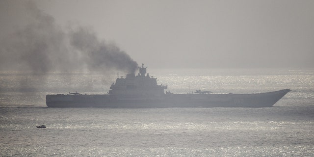 DOVER, ENGLAND - OCTOBER 21: The Russian aircraft carrier Admiral Kuznetsov passes through the English channel on October 21, 2016 near Dover, England. The Russian Navy's flotilla of warships is presumed to be heading to the eastern Mediterranean to support the Russian military's current deployment in Syria. (Photo by Leon Neal/Getty Images)