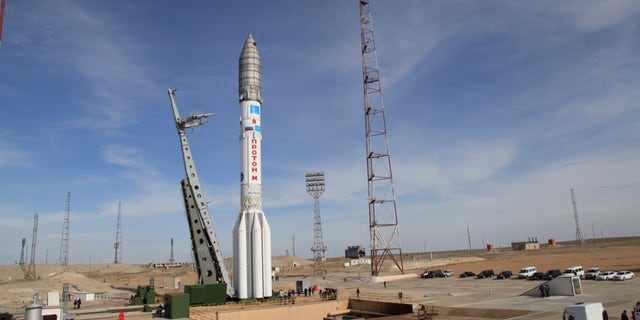 In this photo taken Thursday, April 24, 2014, a Proton-M rocket is installed at launched Baikonur launch pad in Kazakhstan. A Russian rocket, Proton-M, carrying a Mexican satellite malfunctioned Saturday May 16, 2015, shortly after its launch, the latest mishap to hit Russia's troubled space industry, whose Soviet-era glory has been tarnished by a series of launch failures. (Roscosmos via AP)