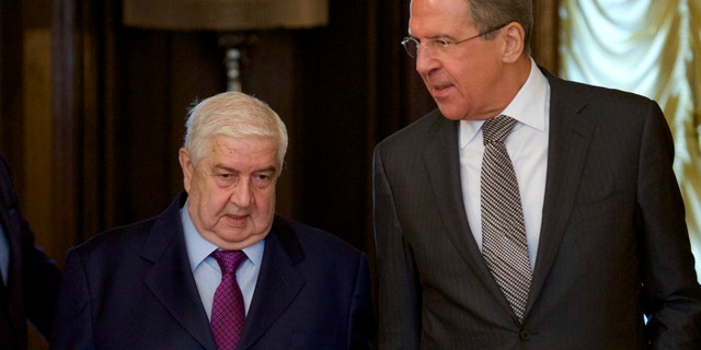 Feb. 25, 2013 - Russian Foreign Minister Sergey Lavrov, right, welcomes Syrian Foreign Minister Walid al-Moallem, left, in Moscow.
