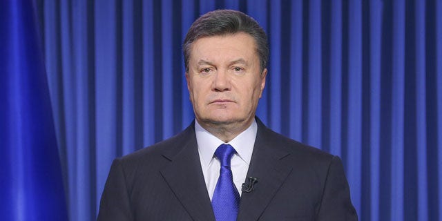 File- This Feb. 19, 2014, file photo shows Ukrainian President Viktor Yanukovych addressing the nation on a live TV broadcast in Kiev, Ukraine. (AP)