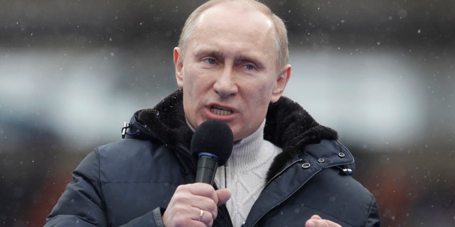 Krievijas premjerministrs Vladimirs Putins piedalās viņa atbalsta mītiņā Lužņiku stadionā Maskavā, 2022. gada 23. februārī.