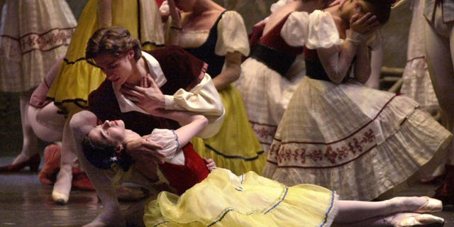 Sergei Filin as Albrecht and Nina Ananiashvili as Giselle perform a tragic scene during a dress rehearsal of the Bolshoi Ballet's United States premiere of "Giselle" at The Lincoln Center for the Performing Arts, in New York.