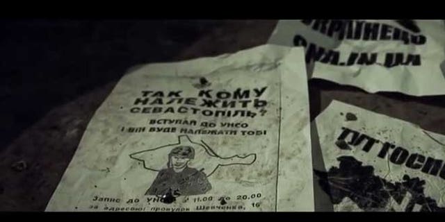 The YouTube video shows leaflets depicting a takeover of Russia by right-wing Ukrainian extremists.