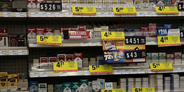 GREENBRAE, CA - FEBRUARY 06: Packs of cigarettes are displayed on a shelf at a CVS store on February 6, 2014 in Greenbrae, California. CVS Caremark announced Wednesday that it will no longer sell cigarettes or other tobacco products as of October 1, 2014 at its CVS/pharmacy stores. (Photo by Justin Sullivan/Getty Images)