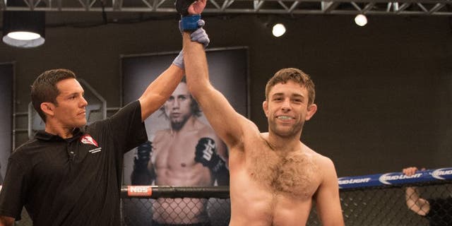 LAS VEGAS, NV - JULY 24: (R-L) Ryan Hall celebrates his submission victory over Frantz Slioa during the filming of The Ultimate Fighter: Team McGregor vs Team Faber at the UFC TUF Gym on July 24, 2015 in Las Vegas, Nevada. (Photo by Brandon Magnus/Zuffa LLC/Zuffa LLC via Getty Images)