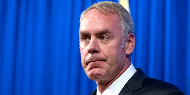 FILE - In this Sept. 29, 2017, file photo, Interior Secretary Ryan Zinke speaks about the Trump Administration's energy policy at the Heritage Foundation in Washington.