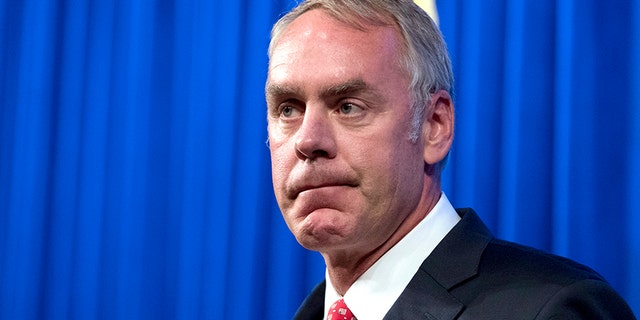 FILE - In this Sept. 29, 2017, file photo, Interior Secretary Ryan Zinke speaks about the Trump Administration's energy policy at the Heritage Foundation in Washington.