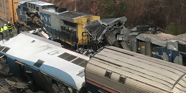 Derailed Amtrak cars after a train traveling from New York to Miami collided with a CSX freight train in South Carolina.